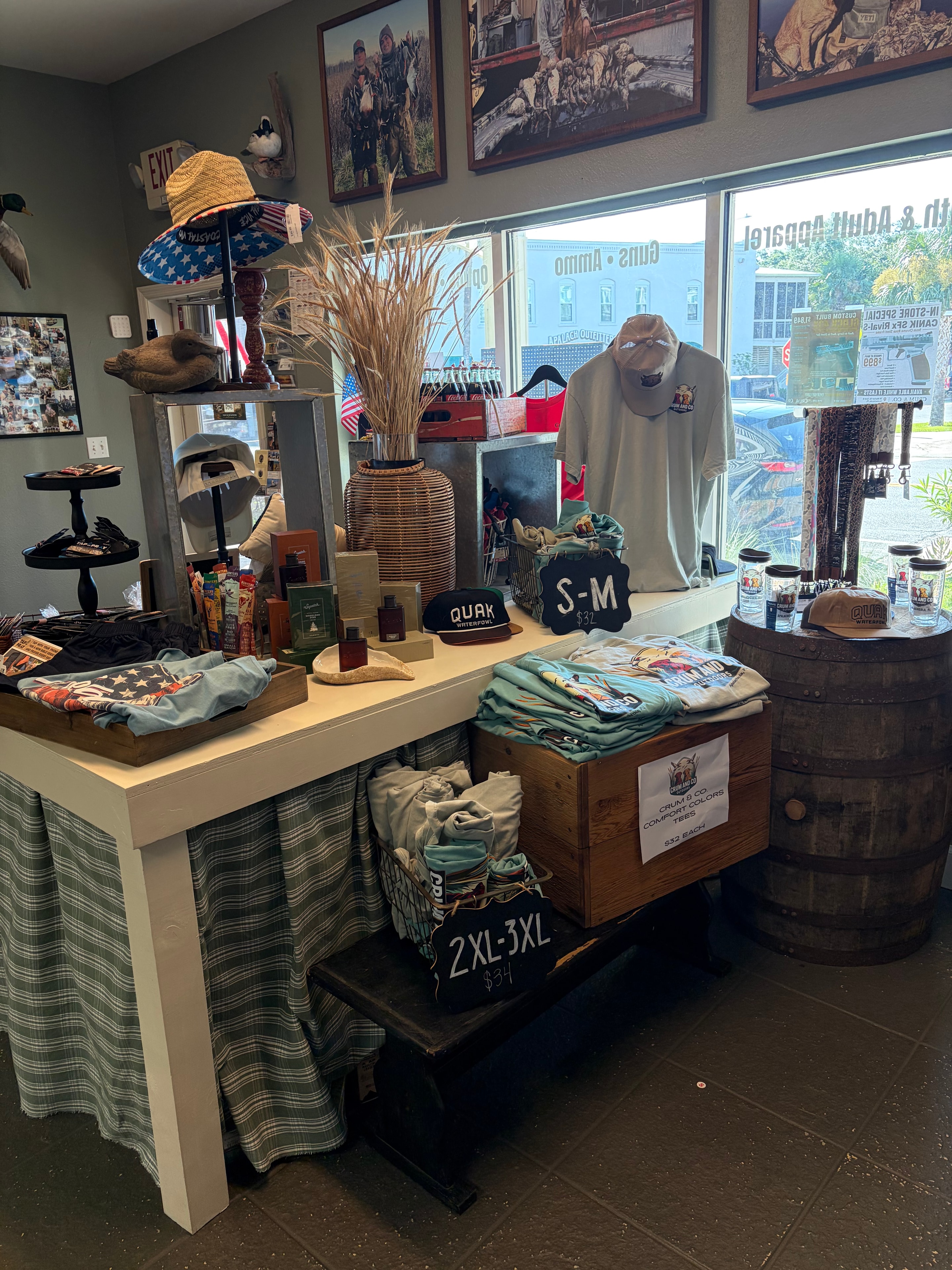 Store interior showing clothing racks and gift merchandise at Crum and Co.