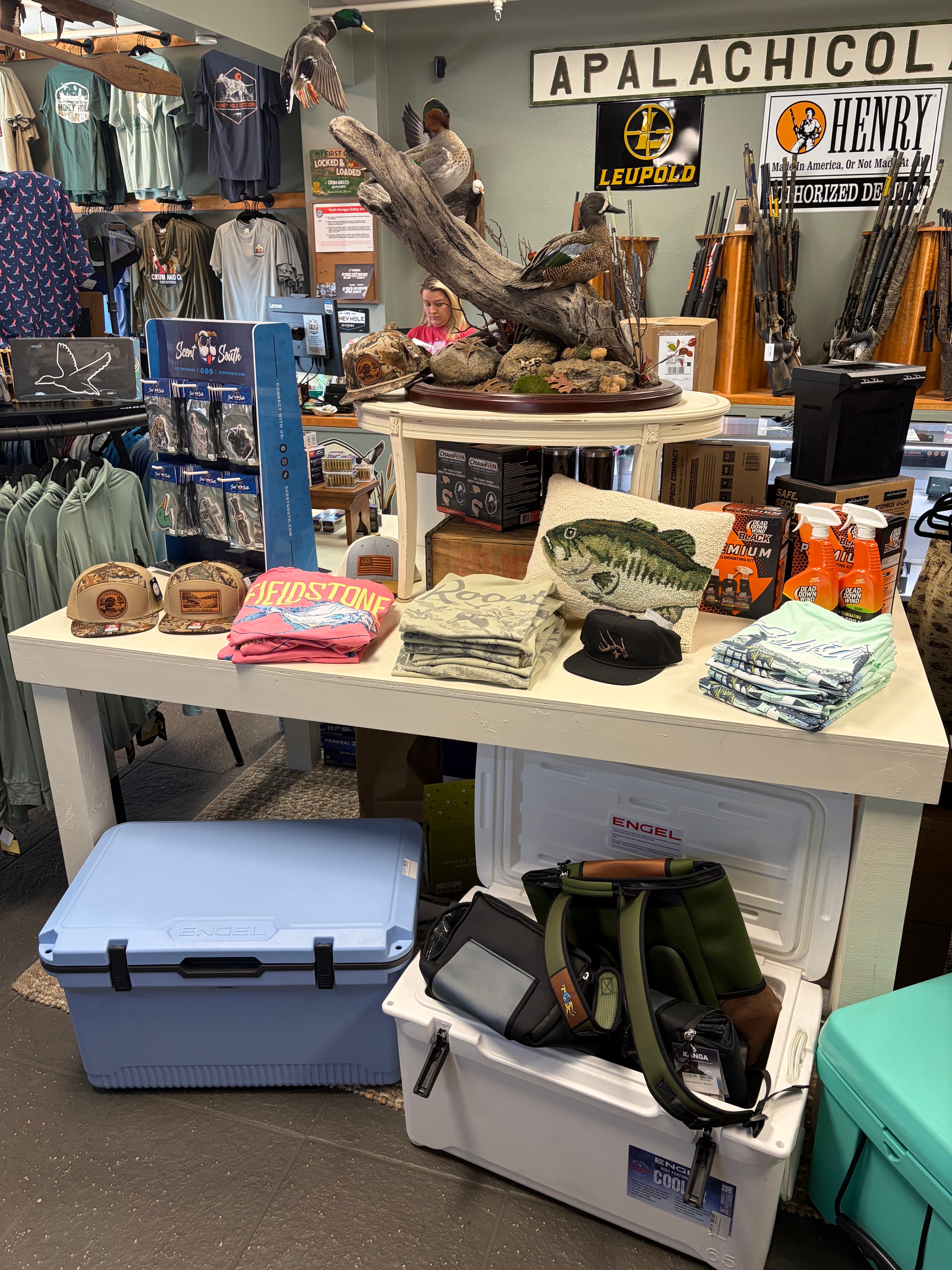 Clothing racks with men's and women's apparel at Crum and Co.